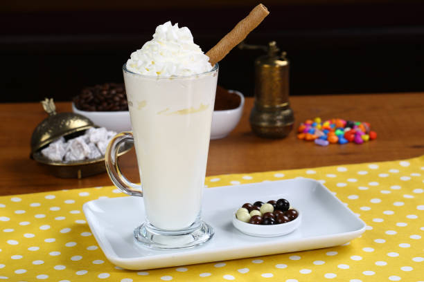 hot white chocolate mocha, decorated with whipped cream - latté hot chocolate hot drink indulgence imagens e fotografias de stock