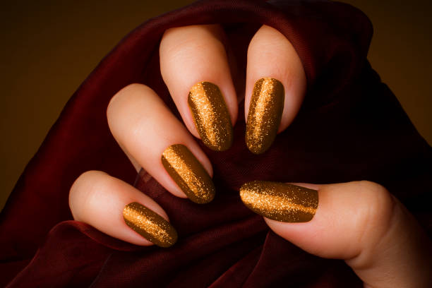 istock shiny golden nails manicure 846347236