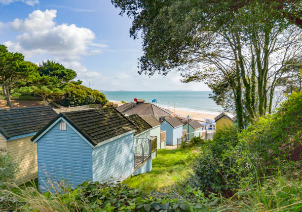 Bournemouth Beach from Alum Chine A view over Beach Huts at Alum Chine to Bournemouth Beach and sea. bournemouth england photos stock pictures, royalty-free photos & images