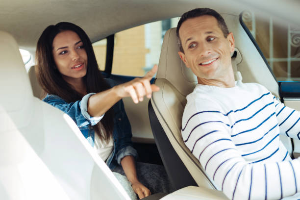 istock Nice beautiful woman pointing with her finger 846348228