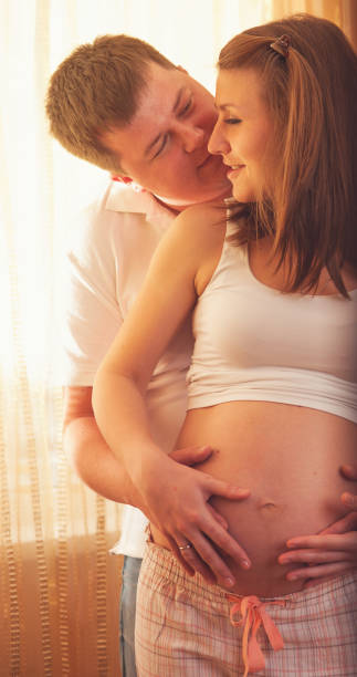 istock Young happy couple expecting baby 846351310