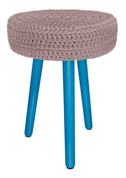 istock Handmade stool turquoise color. Round seat in creamy, woolen material. 846351358