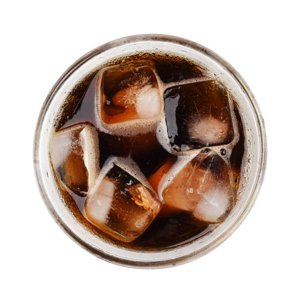 Cola soda with ice on glass isolated on white background top view Cola soda with ice on glass isolated on white background top view vodka soda top view stock pictures, royalty-free photos & images