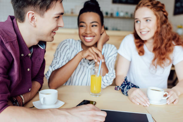 istock multiethnic friends talking in cafe 846357842