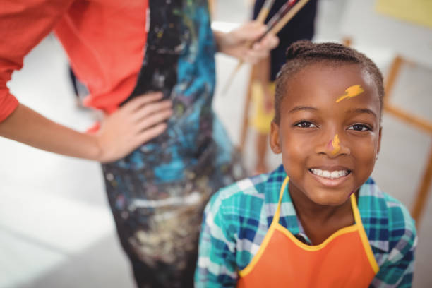 istock smiling girl with paint on face 846362178