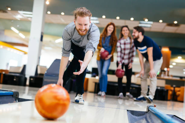 istock Friends bowling at club 846362864
