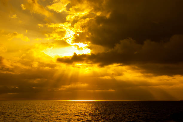 istock Sun breaks through the clouds in Santiago de Cuba and,lights up your hope. 846370306