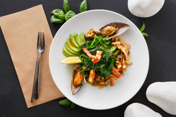 istock Warm salad with grilled seafood flat lay 846376448