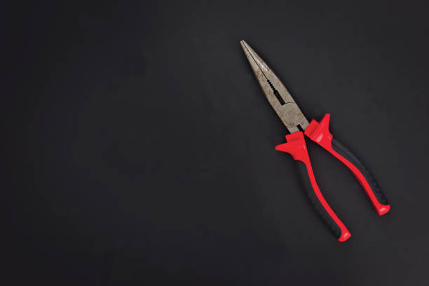 istock Must have at home used hand tools Needle Nose Pliers on black background with copy space 846377344