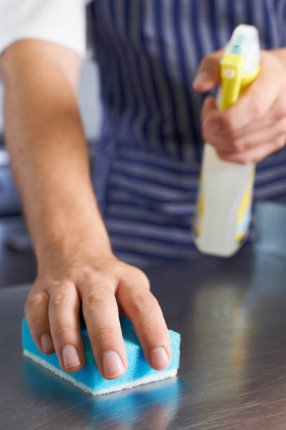 istock Close Up Of Worker In Restaurant Kitchen Cleaning Down After Service 846377366