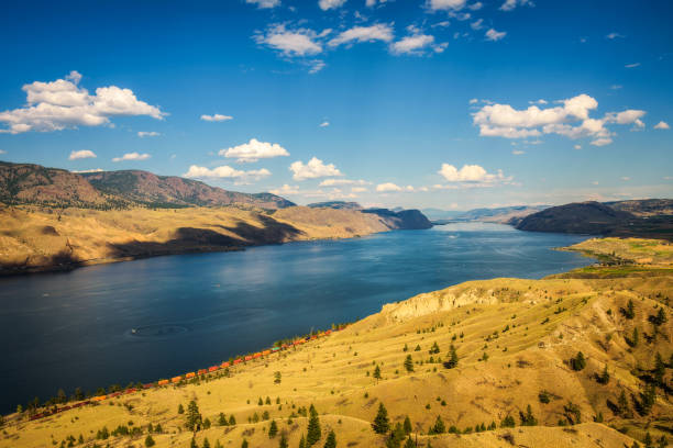 Summer panorama of the Kamloops lake in Canada Scenic summer panorama of the Kamloops lake  situated on the Thompson River along the Trans Canada Highway. kamloops stock pictures, royalty-free photos & images