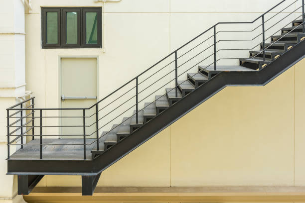 istock stair for fire escape with the steel railing and ladder 846382862