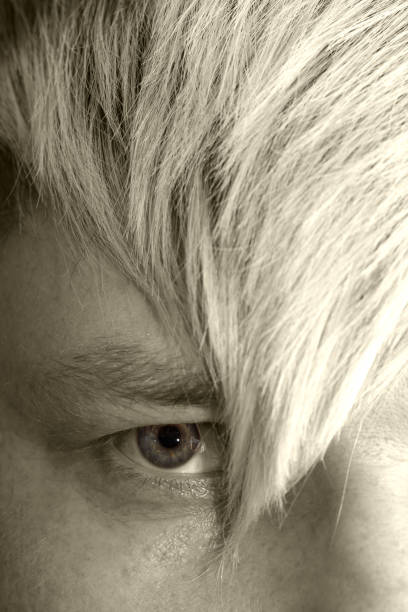 istock lock of hair on the eye 846382982