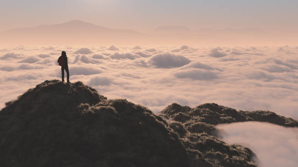 istock The man up the mountain above the clouds 846386140