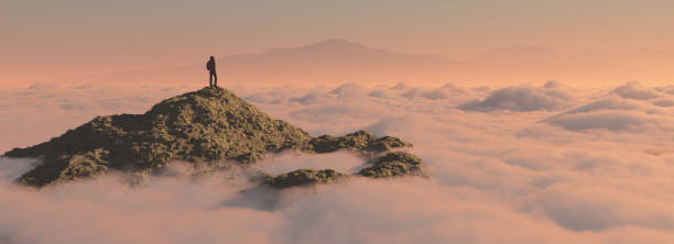 istock The man up the mountain above the clouds 846386156