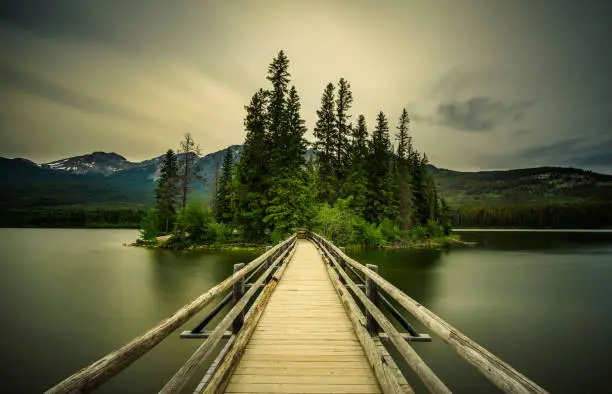 Photo of Cold summer evening at the Pyramid Lake and the little Pyramid Island in Jasper National Park