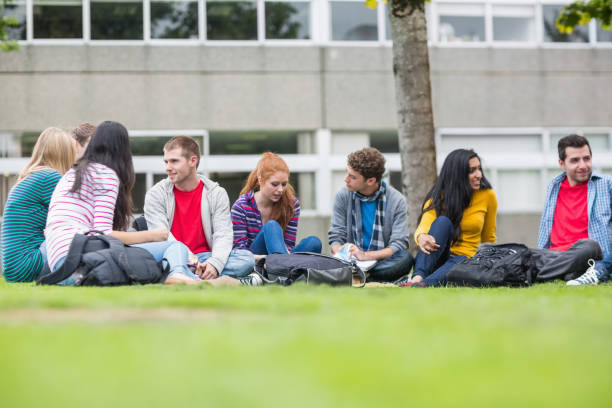 istock College students sitting in the park 846388628