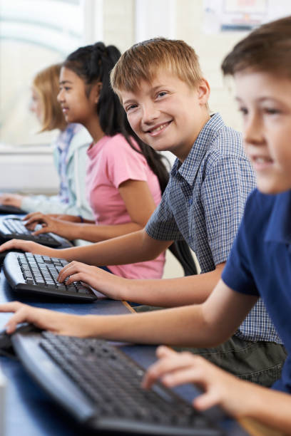 istock Portrait Of Male Elementary Pupil In Computer Class 846391498