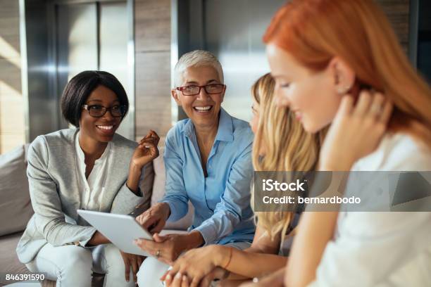Working As A Team Stock Photo - Download Image Now - Businesswoman, Women, Mature Women