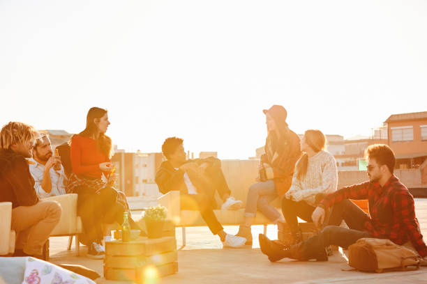 istock Friends enjoying on building terrace in summer 846394048