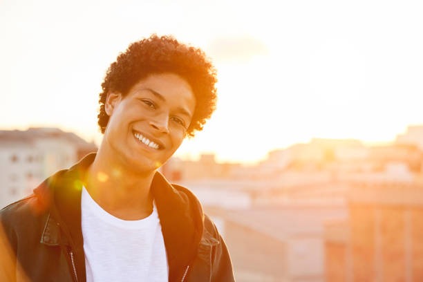 istock Portrait of young man smiling at rooftop 846394802