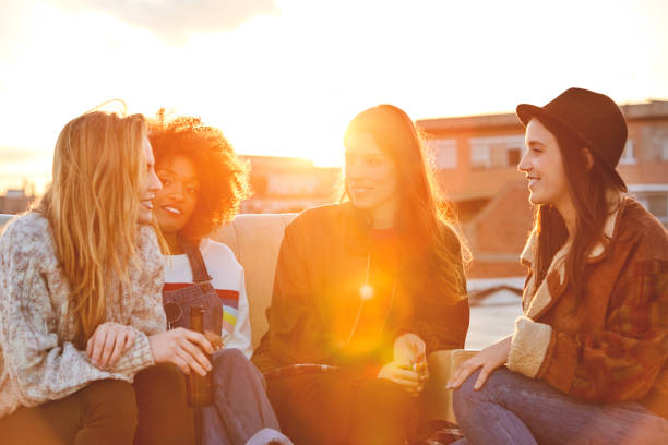 istock Happy young women gossiping at rooftop 846394830