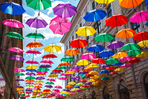 Romania, Timisoara, May 21, 2017: Street decorated with colored umbrellas in Timisoara, Romania