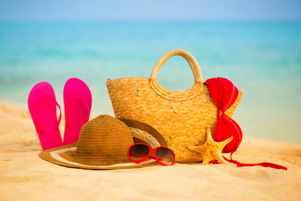 istock Summer beach with accessories. Blur azure sea on background 846399966