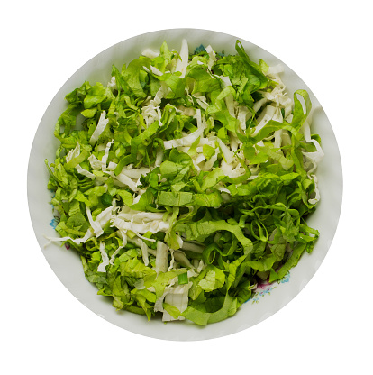 cabbage salad in a plate isolated on white background .  Top view