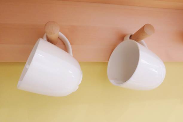 istock Two Empty Cup of Coffee Hanging on The Wall 846401802