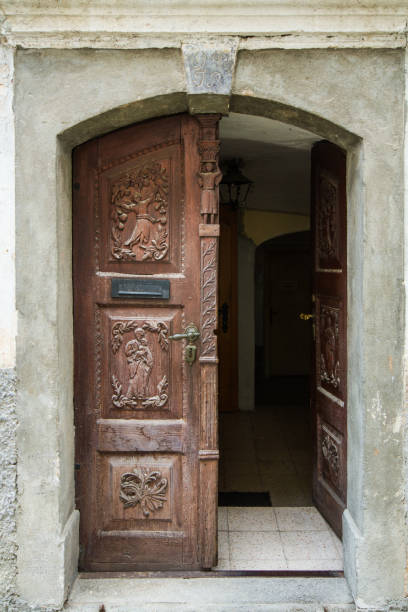 istock Old door with hand carvings 846407440