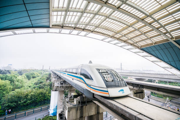 Maglev Train in Shanghai Shanghai, China - November 21, 2016: Maglev train leaving the station. The maglev train located in Shanghai, China is the fastest train around the world,  which can run at the speed of 268mph. maglev train stock pictures, royalty-free photos & images