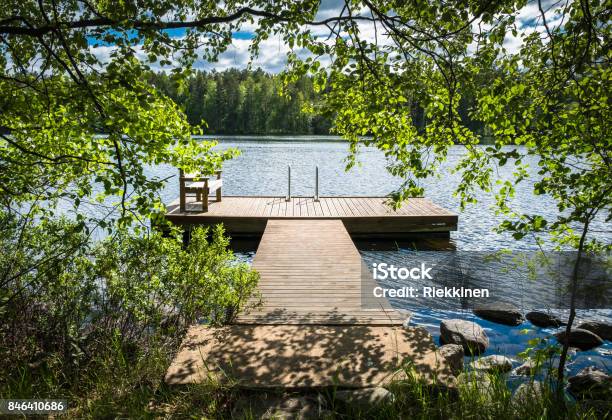 Idyllic Lake View With Pier At Bright Sunny Summer Day Stock Photo - Download Image Now