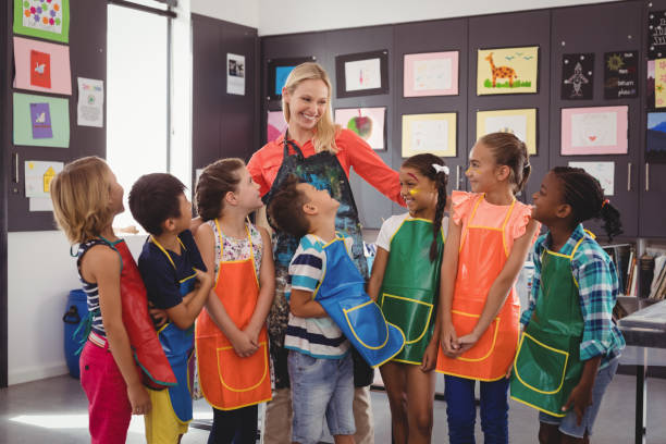 istock Teacher and schoolkids interacting with each other 846410974