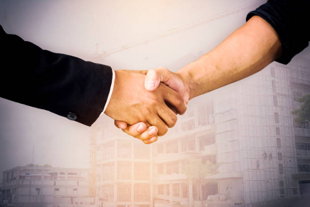 istock handshake of business partners - Image handshake agreement 846411236