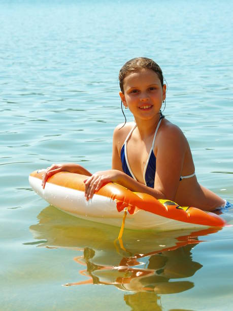istock Girl on air mattress 846411632