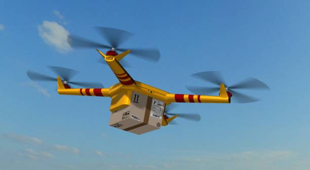 istock yellow delivery drone - drone delivery a cardboard package 846412042