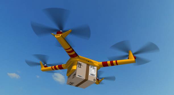 istock yellow delivery drone - drone delivery a cardboard package 846412120