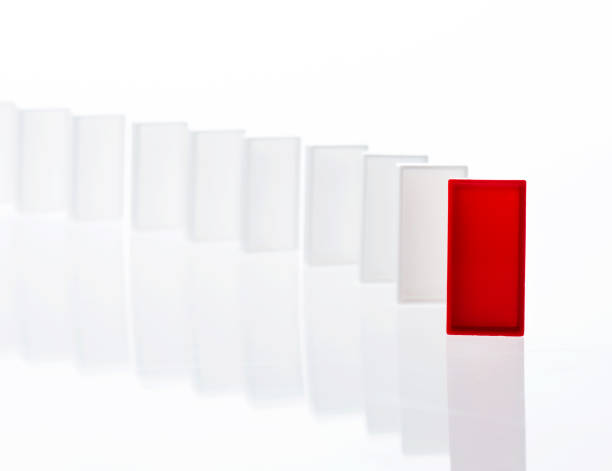 istock The red domino stands out 846414828
