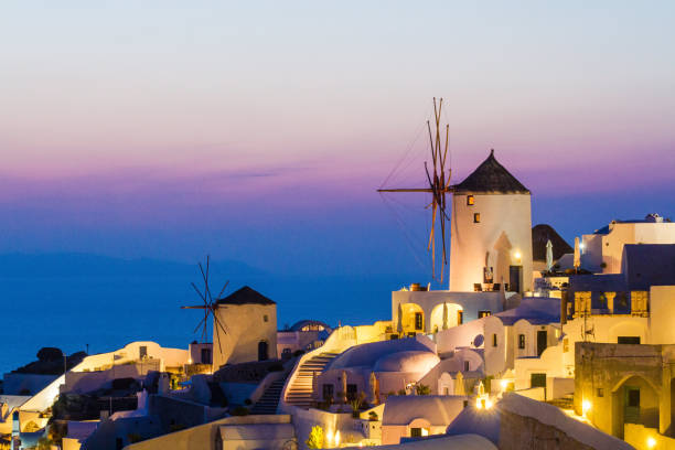 istock Windmills at sunset, Oia,  Santorini, Greece 846415414