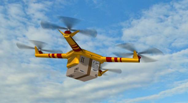 istock yellow delivery drone - drone delivery a cardboard package 846418348