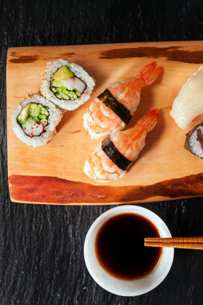istock Homemade sushi with salmon, smoked eel, curd cheese and vegetabl 846418922