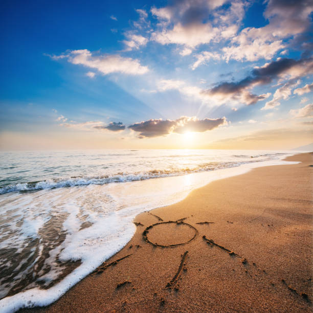 istock Drawing heart on yellow sand on the fantastic sunset 846421774