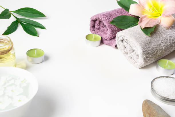 istock Spa setting of towel, flower isolated on white background with copy space. 846425610