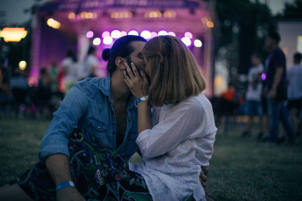 istock Couple on a festival kissing 846428362