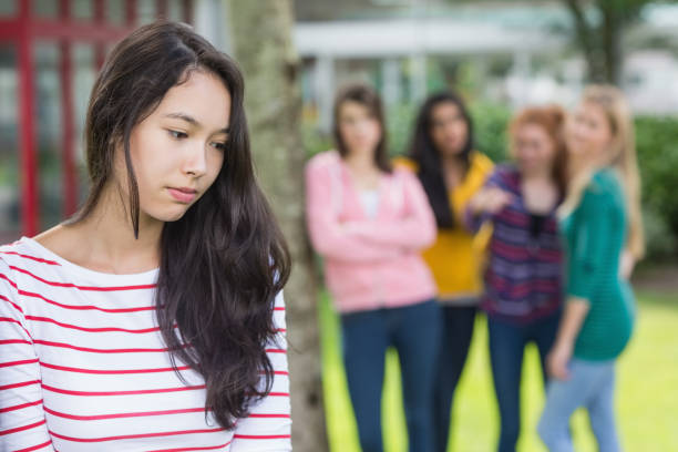 istock Student being bullied by a group of students 846428676