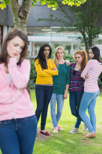 istock Student being bullied by a group of students 846428854