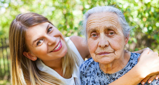 istock Hugging grandma in the park 846434684