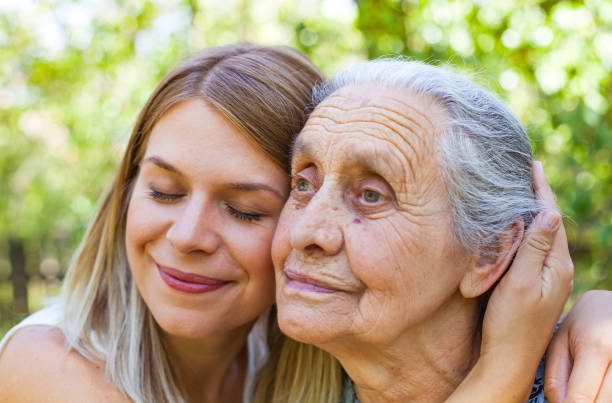 istock Hugging grandma in the park 846435062