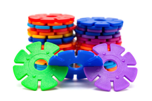 colorful plastic snowflake toy on white background